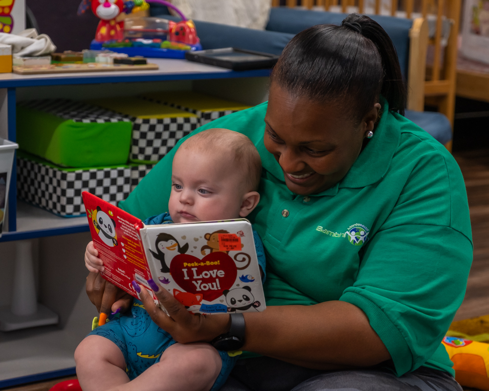 staff reading to children